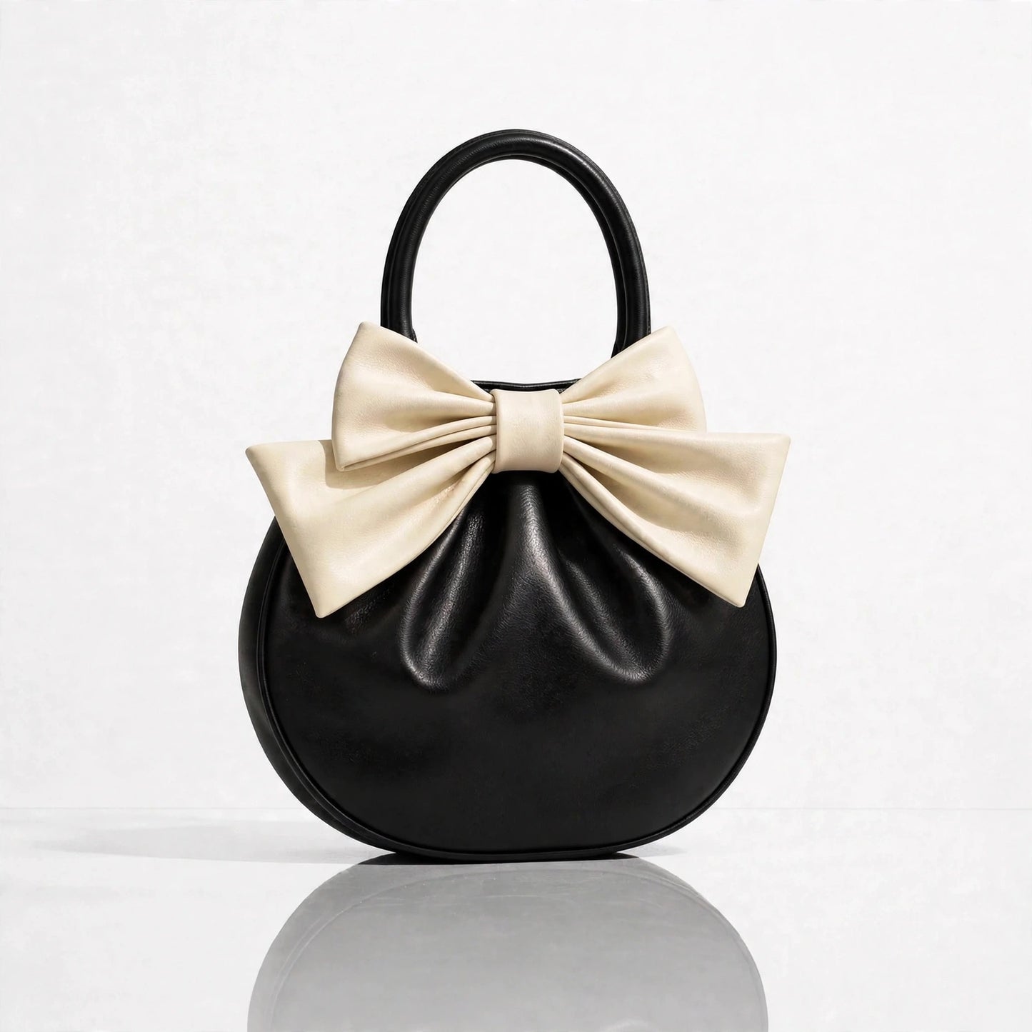 NOELLE BOW HANDBAG
